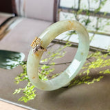 52.6mm A-Grade Natural Osmanthus Floral Jadeite Modern Oval Bangle with Osmanthus Embellishment No.152203