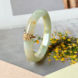 50.6mm A-Grade Natural Osmanthus Floral Jadeite Modern Oval Bangle with Osmanthus Embellishment No.152205