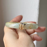 50.6mm A-Grade Natural Osmanthus Floral Jadeite Modern Oval Bangle with Osmanthus Embellishment No.152205