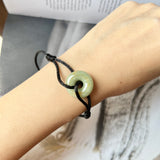 A-Grade Natural Yellowish Green Jadeite Bagel on Infinity Silk Cord Bracelet No.190406